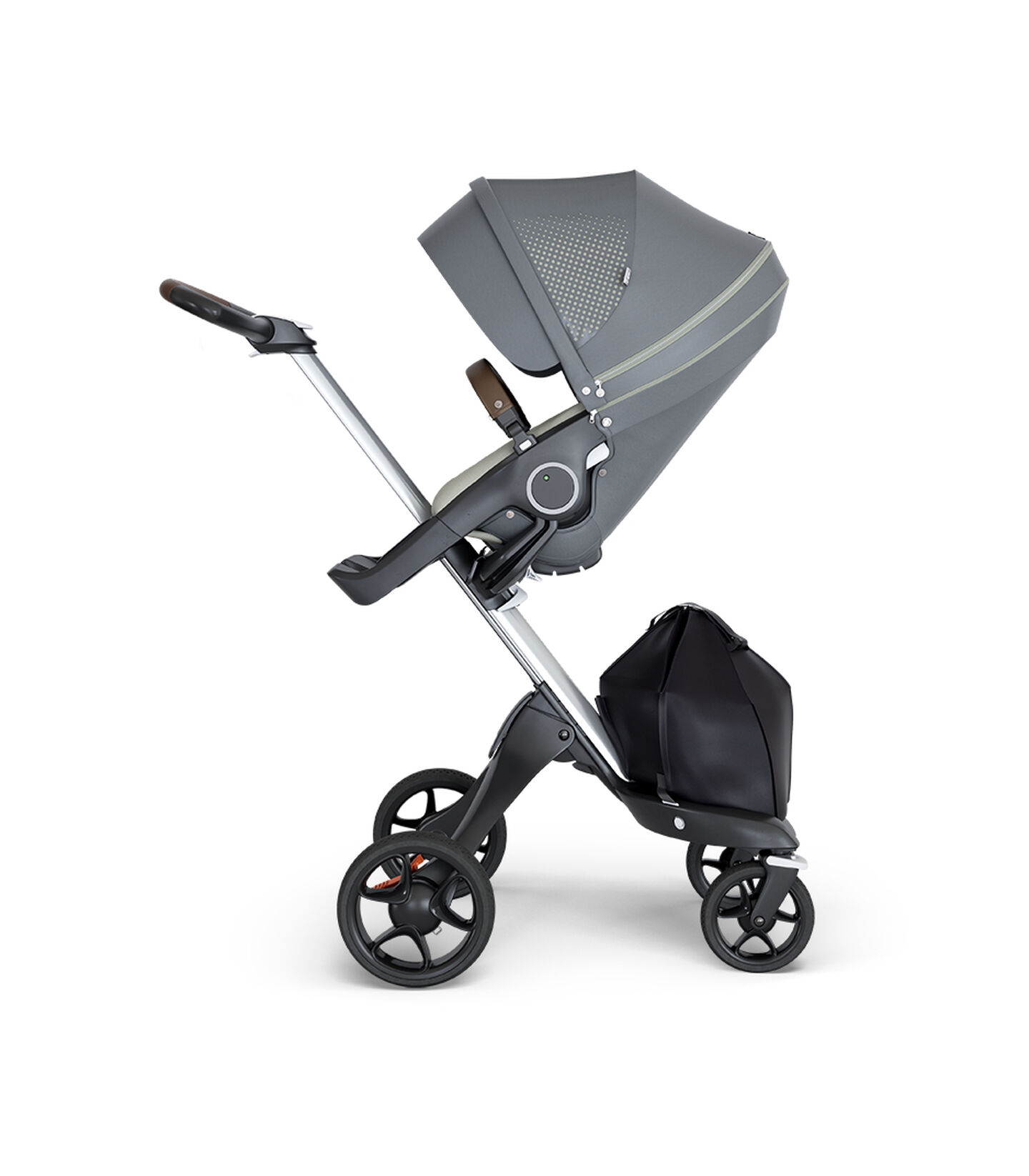 Stokke® Xplory® wtih Silver Chassis and Leatherette Brown handle. Stokke® Stroller Seat Athleisure Green. view 1