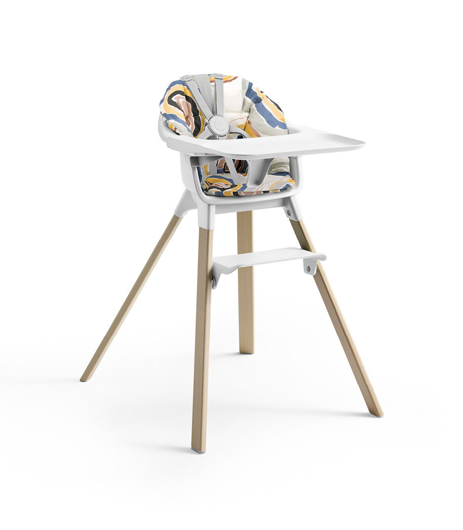 Stokke® Clikk™ High Chair with Tray and Harness, in Natural and White. Cushion Multi Circle.