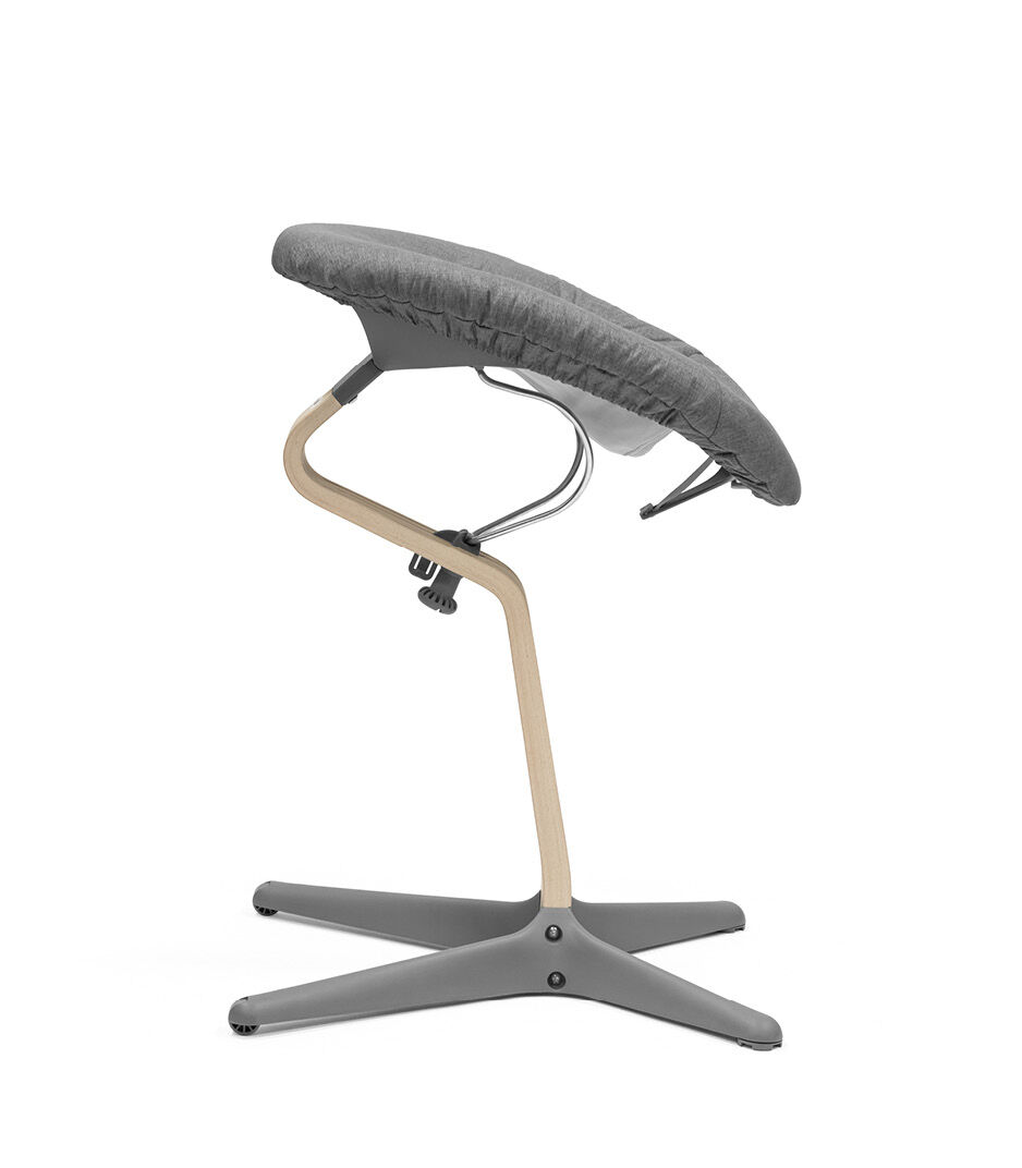 Stokke® Nomi® Chair Natural-Grey with Newborn Set Grey. Active position. galery image 9