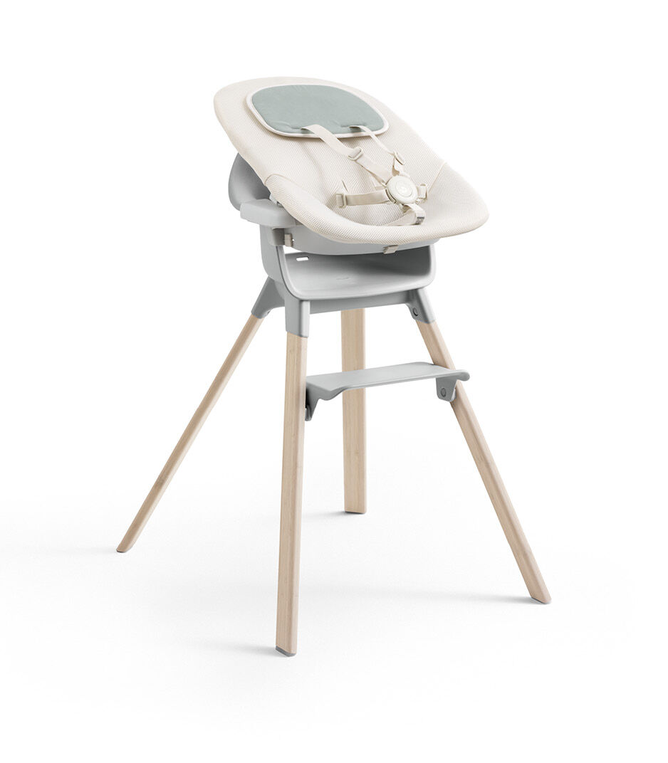 Stokke® Clikk™ High Chair Natural/Cloud Grey. Newborn Set. Front angled view. 