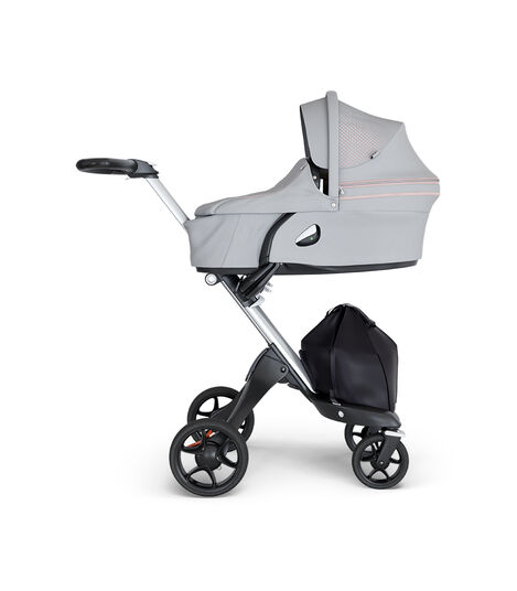 Stokke® Xplory® wtih Silver Chassis and Leatherette Black handle. Stokke® Stroller Carry Cot Athleisure Pink. view 2