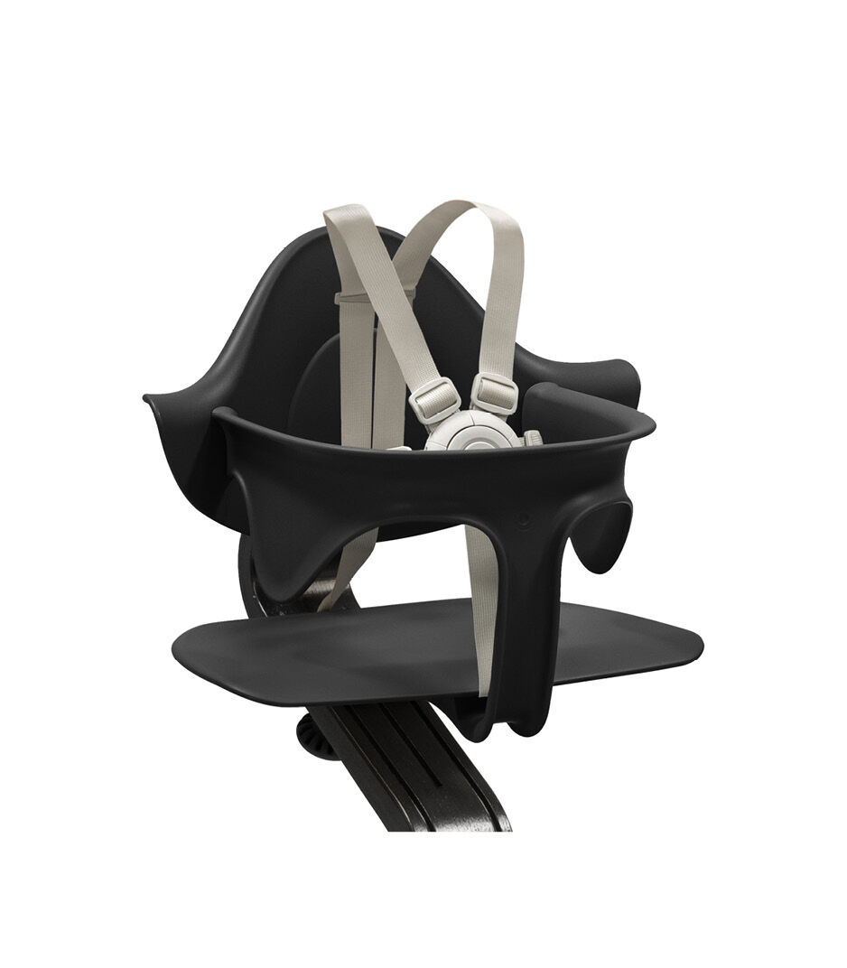 Stokke® Nomi® Chair Black-Black with Baby Set. US variant w/Harness. Close-up.
