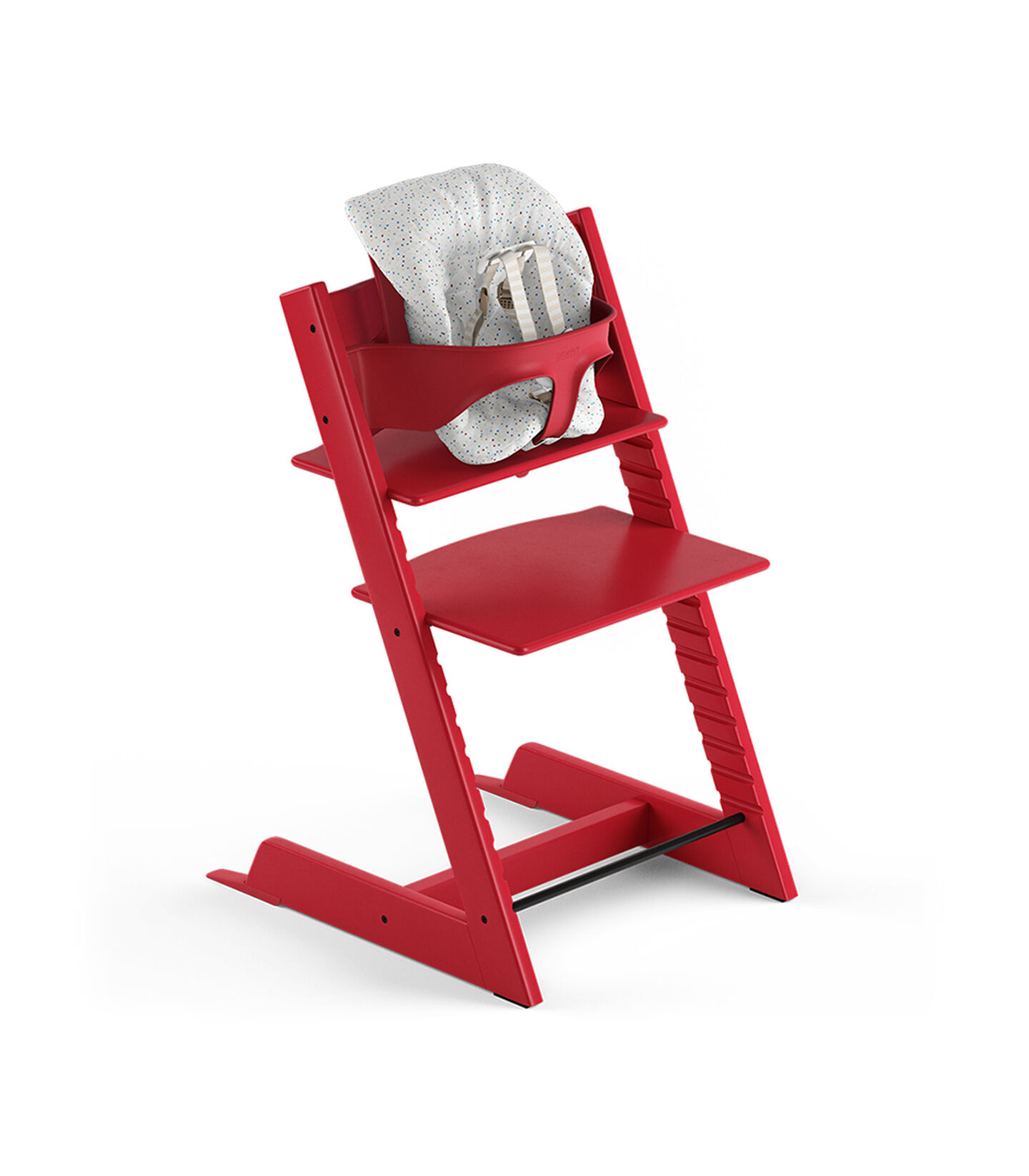 Tripp Trapp® Red, Beech. With Tripp Trapp® Baby Set and Baby Cushion Soft Sprinkle. US version with Harness. Tripp Trapp® Red, Beech. With Tripp Trapp® Baby Set and Baby Cushion Soft Sprinkle. US version with Harness.