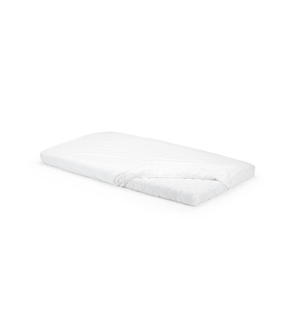 Stokke® Home™ Mattress. Fitted Sheet White, Sold separately.