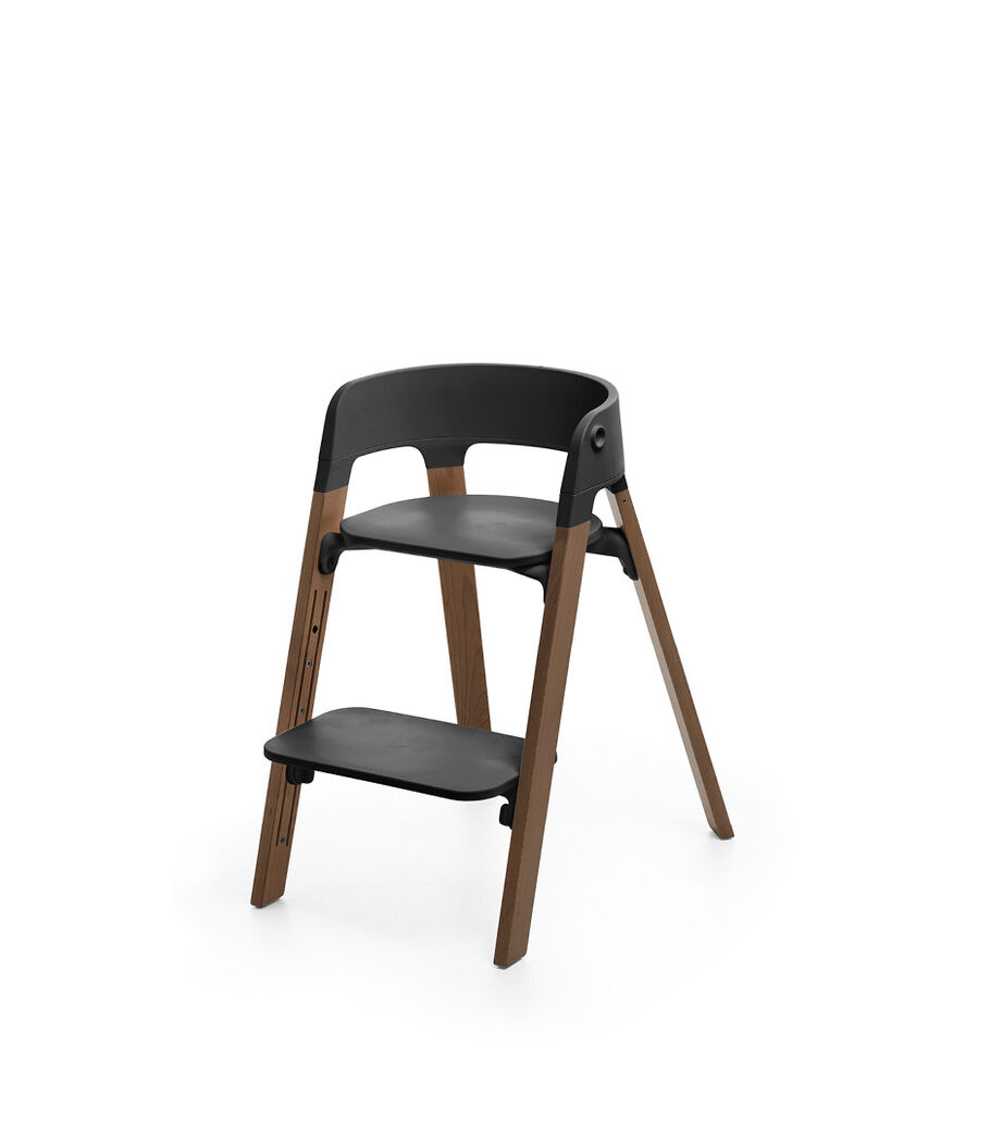 Stokke® Steps™ Chair, Golden Brown with Black Seat. Footrest low. view 6