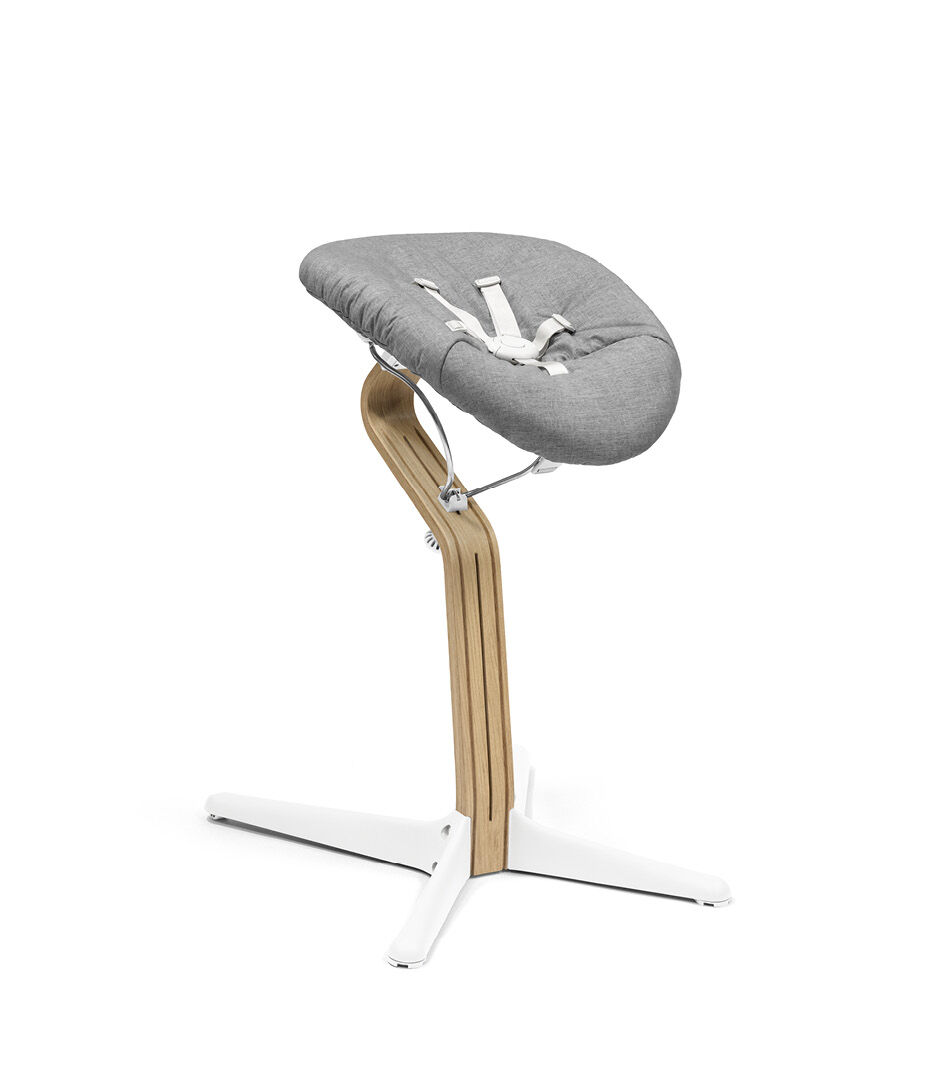 Stokke® Nomi® Chair. Premium Oak wood and White plastic parts with Newborn Set, Grey textile cover. galery image 4