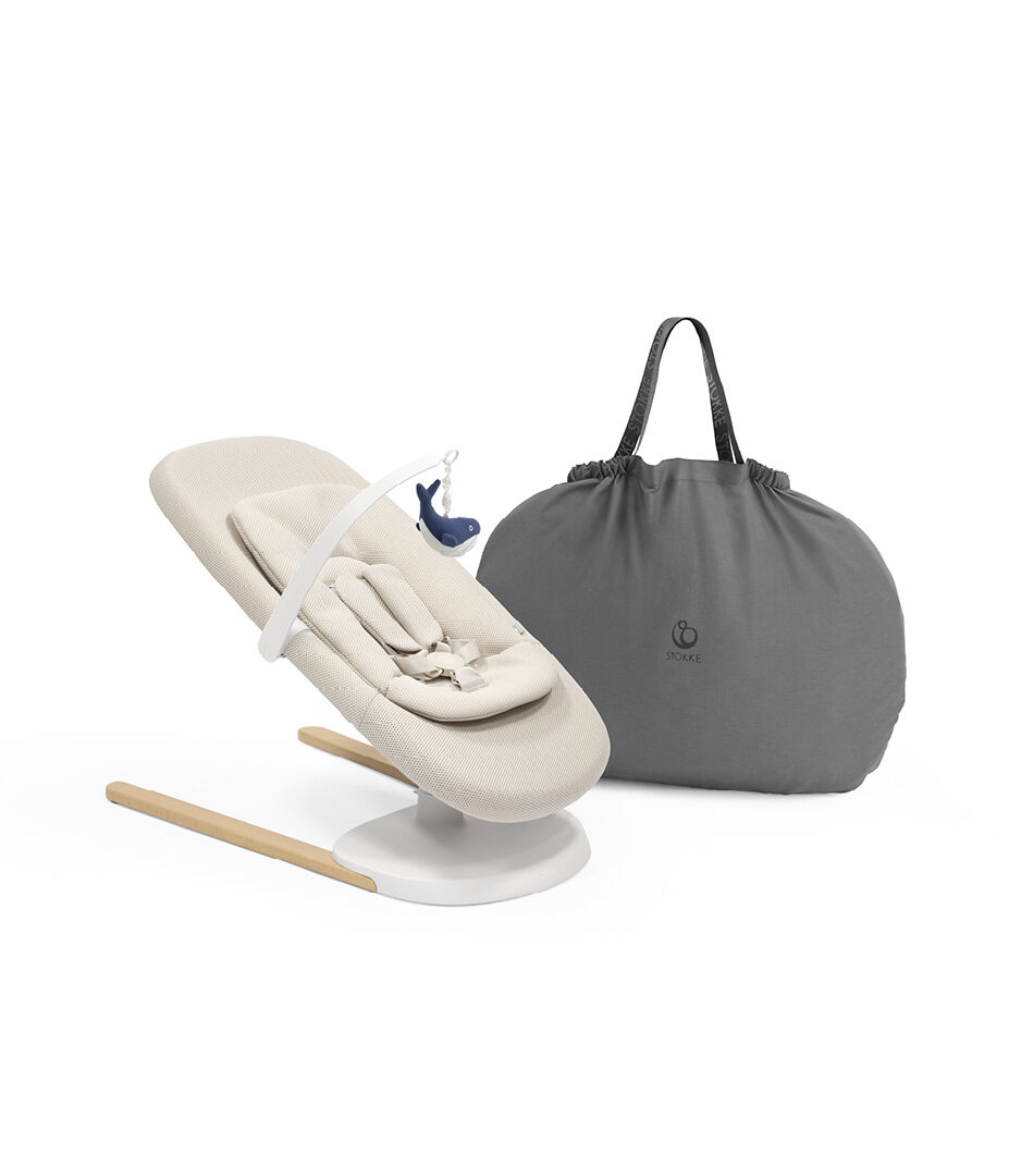 Stokke® Yoga™ Bouncer Light Sand. Low position with inlay. Toy Hanger with Plush Whale Toy. Transport bag. galery image 3