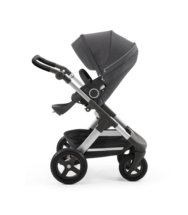 Stokke® Trailz™ with Silver Chassis and Stokke® Stroller Seat Athlesure Grey. Terrain Wheels. view 1