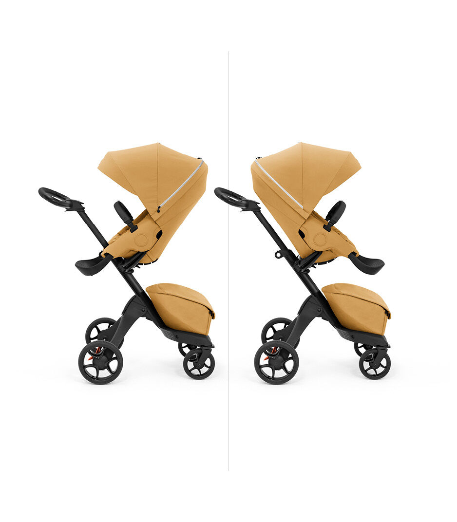 Stokke® Xplory X with seat, Golden Yellow. Parent and forward facing.