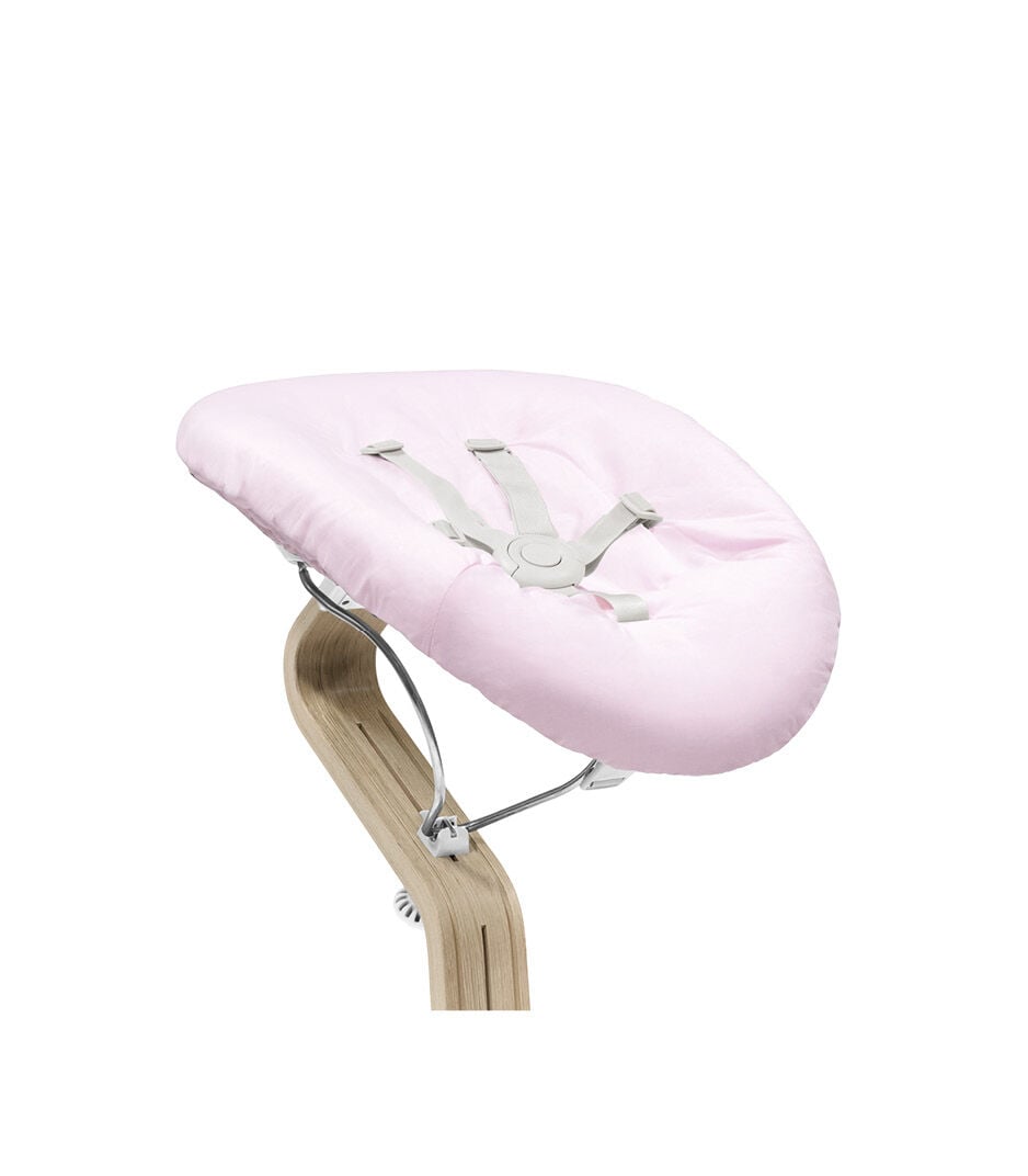 Stokke® Nomi® Chair Natural-White with Newborn Set Pink. Close-up. galery image 2