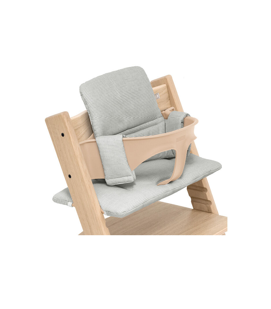Tripp Trapp® chair Oak Natural, with Baby Set and Classic Cushion Nordic Grey.