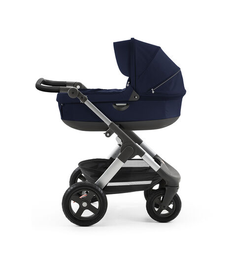 Stokke® Trailz™ with silver chassis  and Stokke® Stroller Carry Cot, Deep Blue. Leatherette Handle. view 2