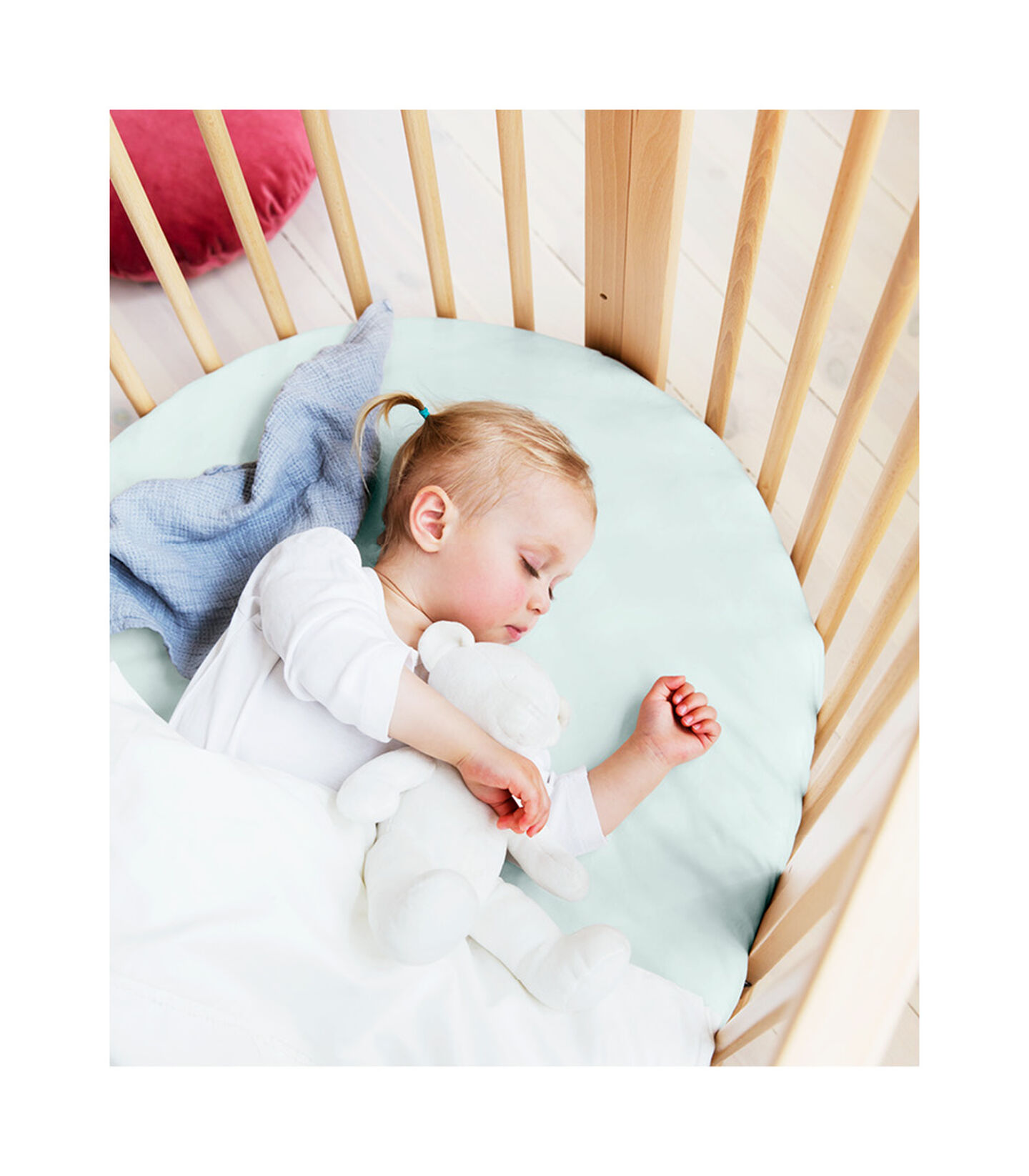 Stokke® Sleepi™ Bed, Natural with Fitted Sheet Powder Blue. view 2