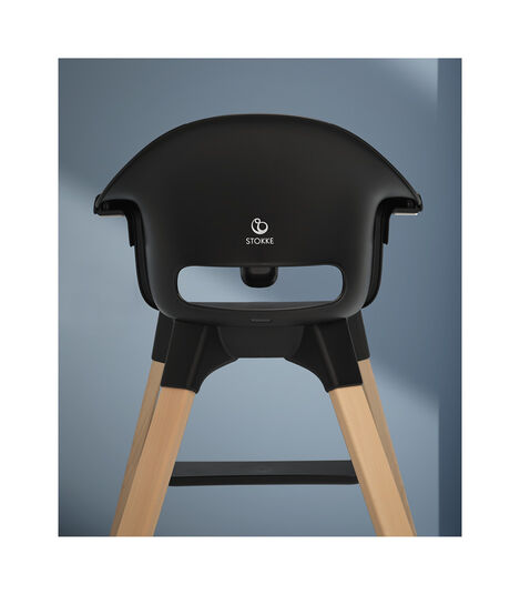 Stokke® Clikk™ High Chair Black with Natural Beech legs. Styled. view 3