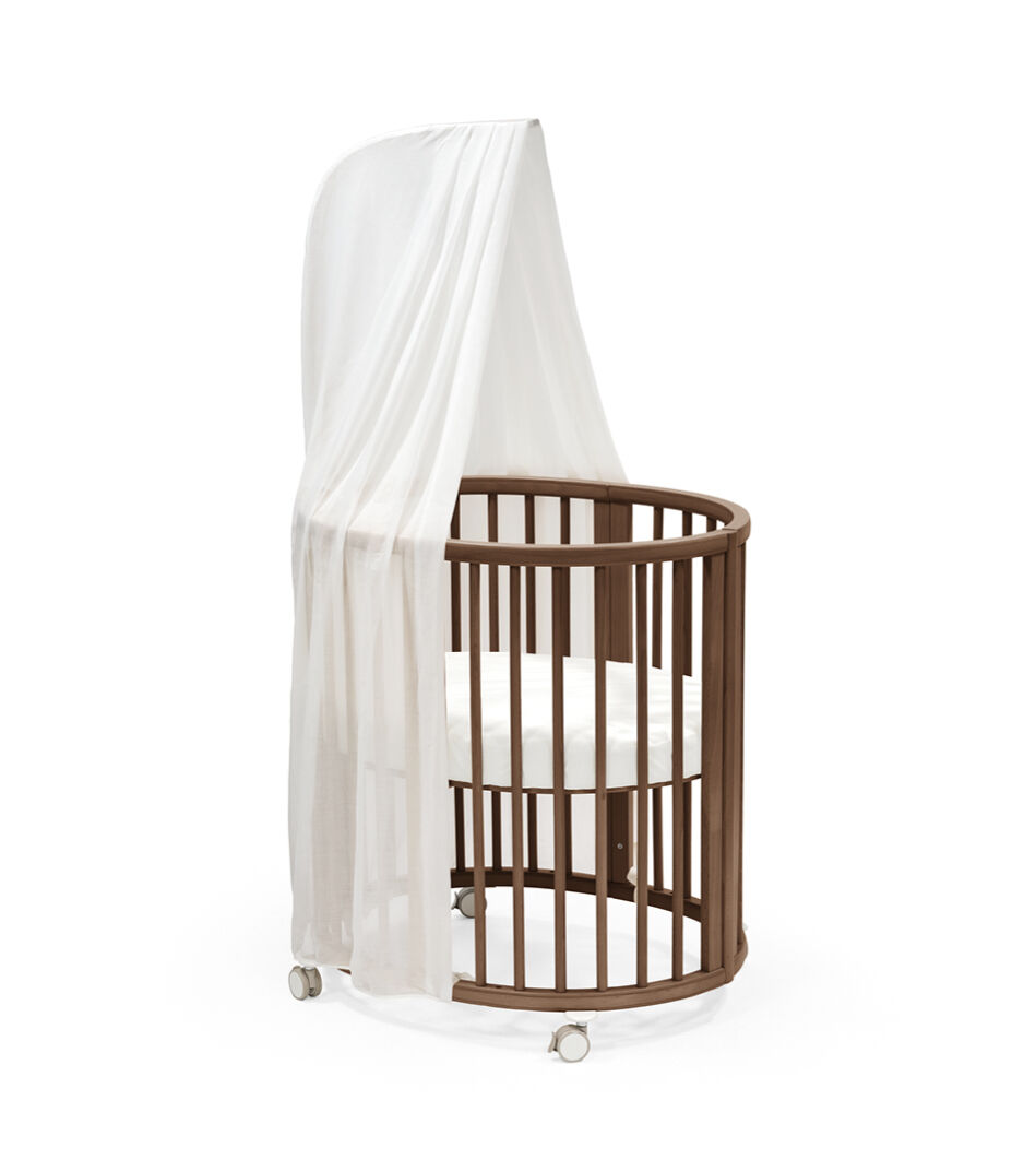 Stokke® Sleepi Mini, Warm Brown. White Fitted Sheet and Canopy.