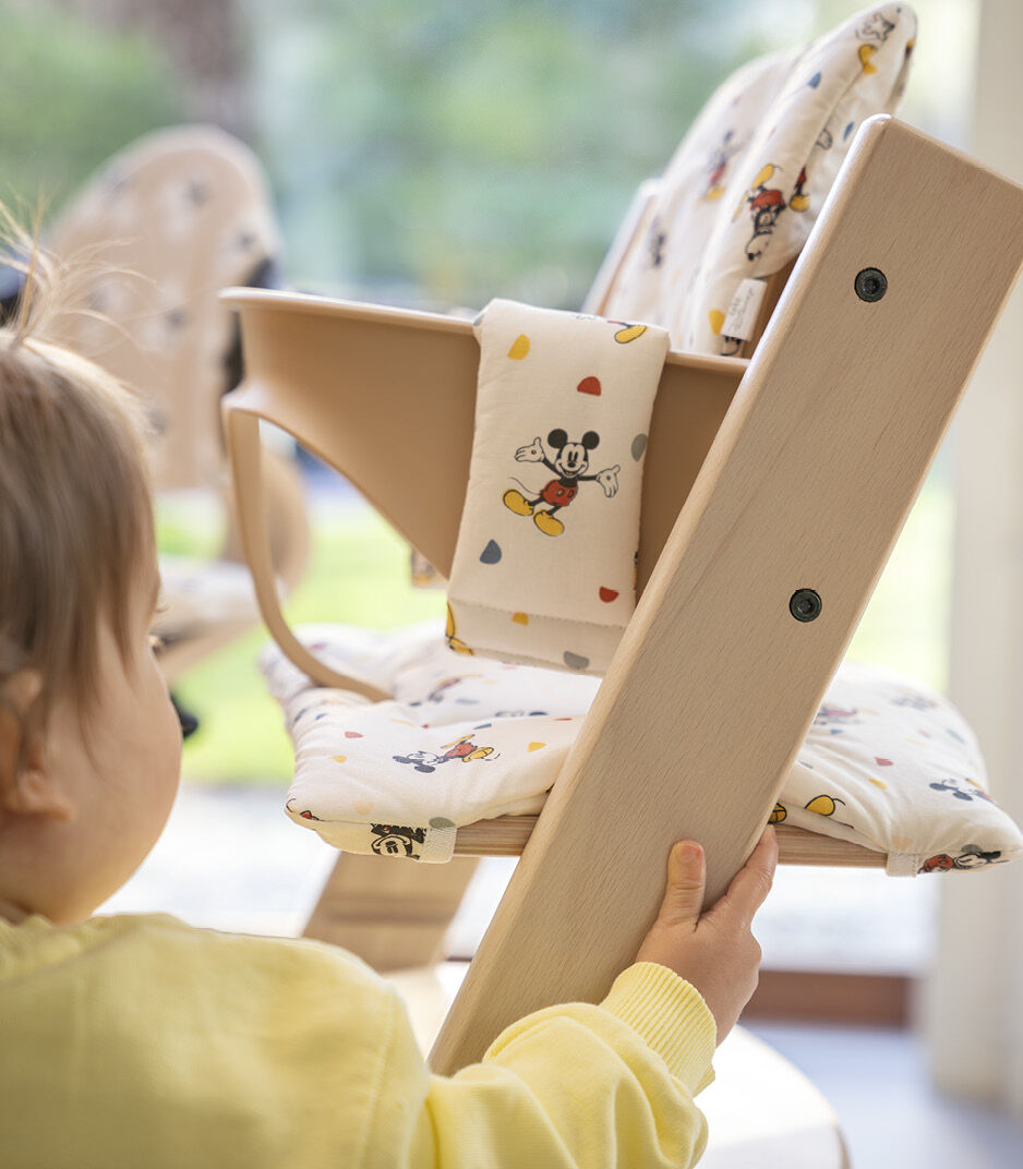 Tripp Trapp® High Chair, Natural. Disney Mickey Celebration Cushion. Close-up.