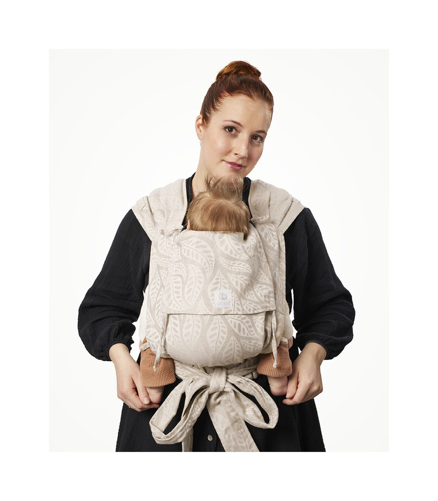Stokke® Limas™, Valerian Beige. Front carrying. view 5