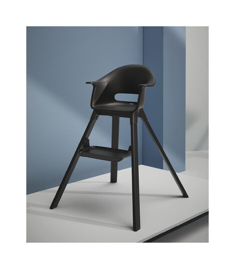 Stokke® Clikk™ High Chair. Midnight Black. Black with Black Beech legs. Styled. view 2