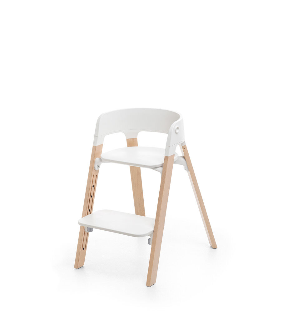 Stokke® Steps™ Chair, Beech Natural with White Seat. Footrest low.