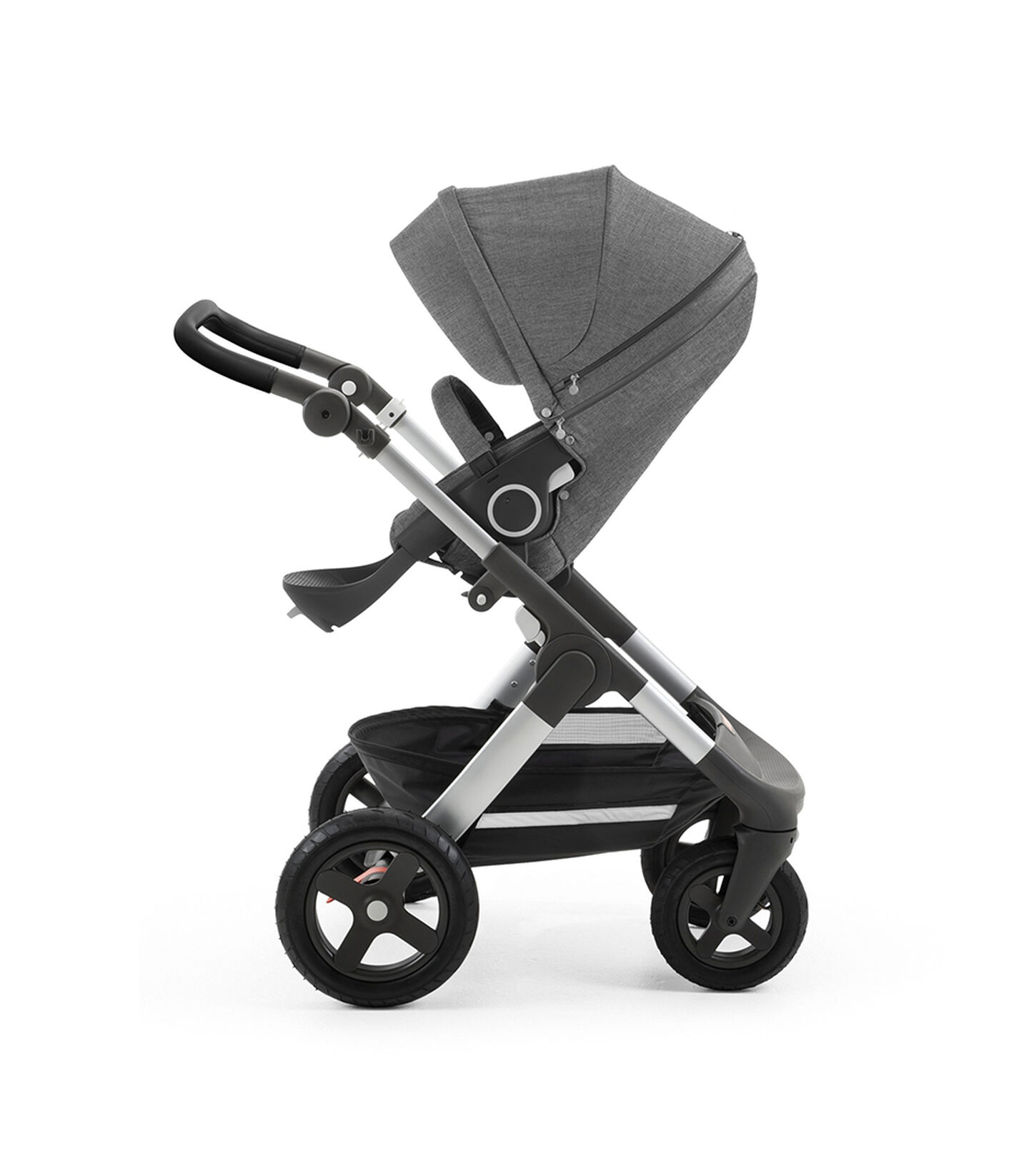 Stokke® Trailz™ with silver chassis and Stokke® Stroller Seat, Black Melange. Leatherette Handle. Terrain Wheels. view 1