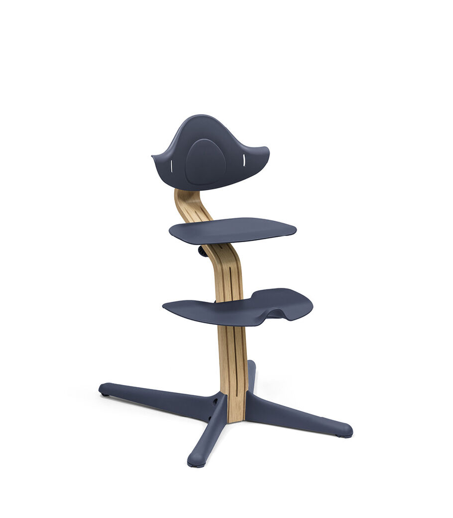Stokke® Nomi® Chair. Premium Oak wood and Navy plastic parts.  view 10