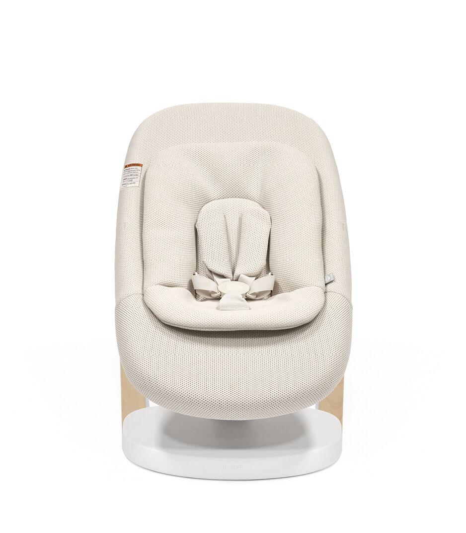 Stokke® Yoga™ Bouncer Light Sand. Middle position with inlay. Front view. US variant. galery image 10