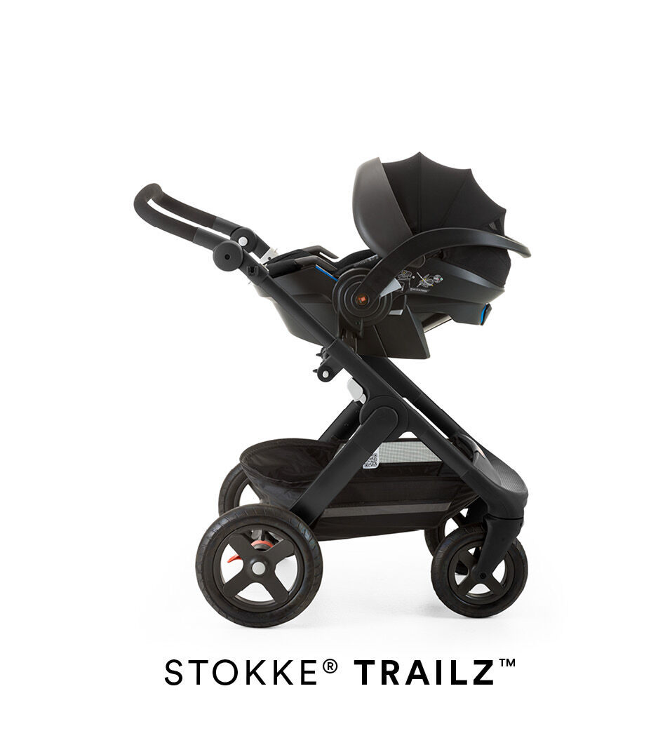 Stokke® iZi Go Modular™ X1 by Besafe®, Black. Mounted on Stokke® Trailz™.