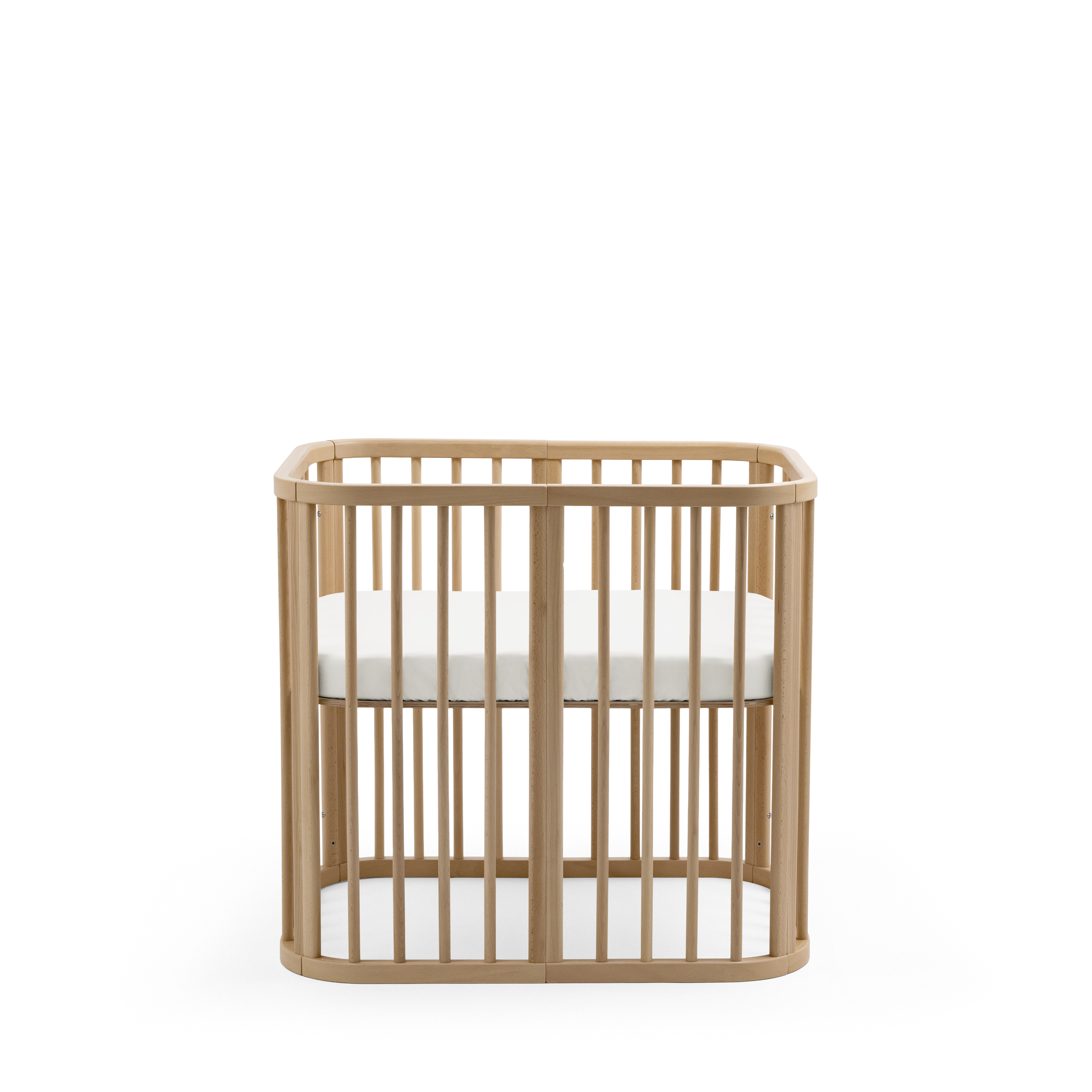 Stokke® Nighti™ Mini Natural. Fitted Sheet, White. Profile view. galery image 1