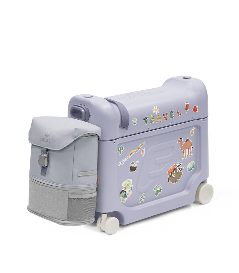 Stokke® JetKids™ BedBox™ V4. Arctic Blue with Sticker set "Animal". With BackPack attached.