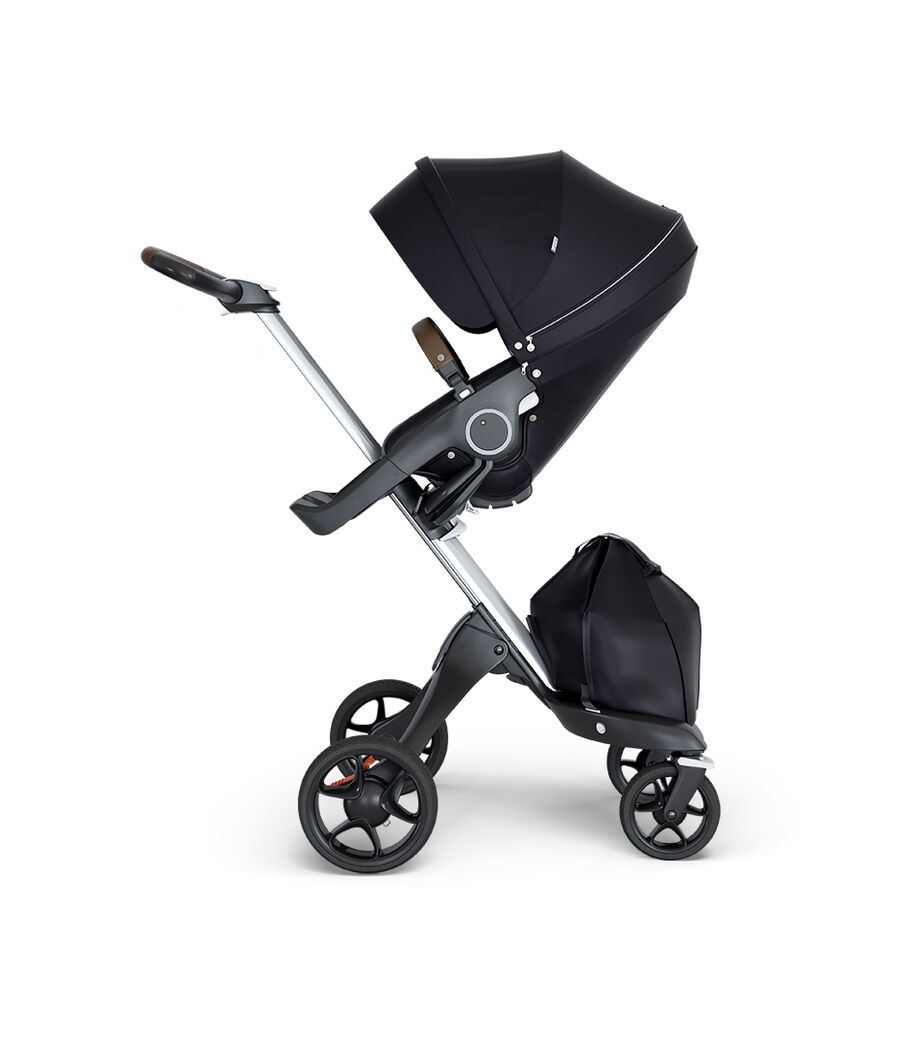 Stokke® Xplory® wtih Silver Chassis and Leatherette Brown handle. Stokke® Stroller Seat Black. view 4