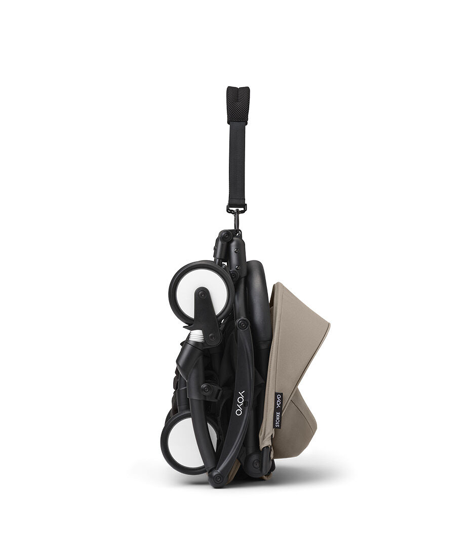 Stokke® YOYO3® 6+ Taupe. Black Frame. Folded, vertical.