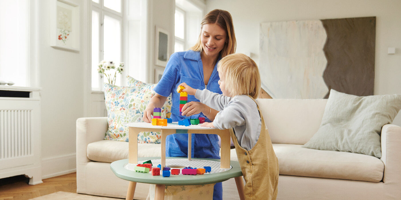 Stokke® MuTable™ Table Clover Green. Basic Bricks. Bricks Tower. view 1
