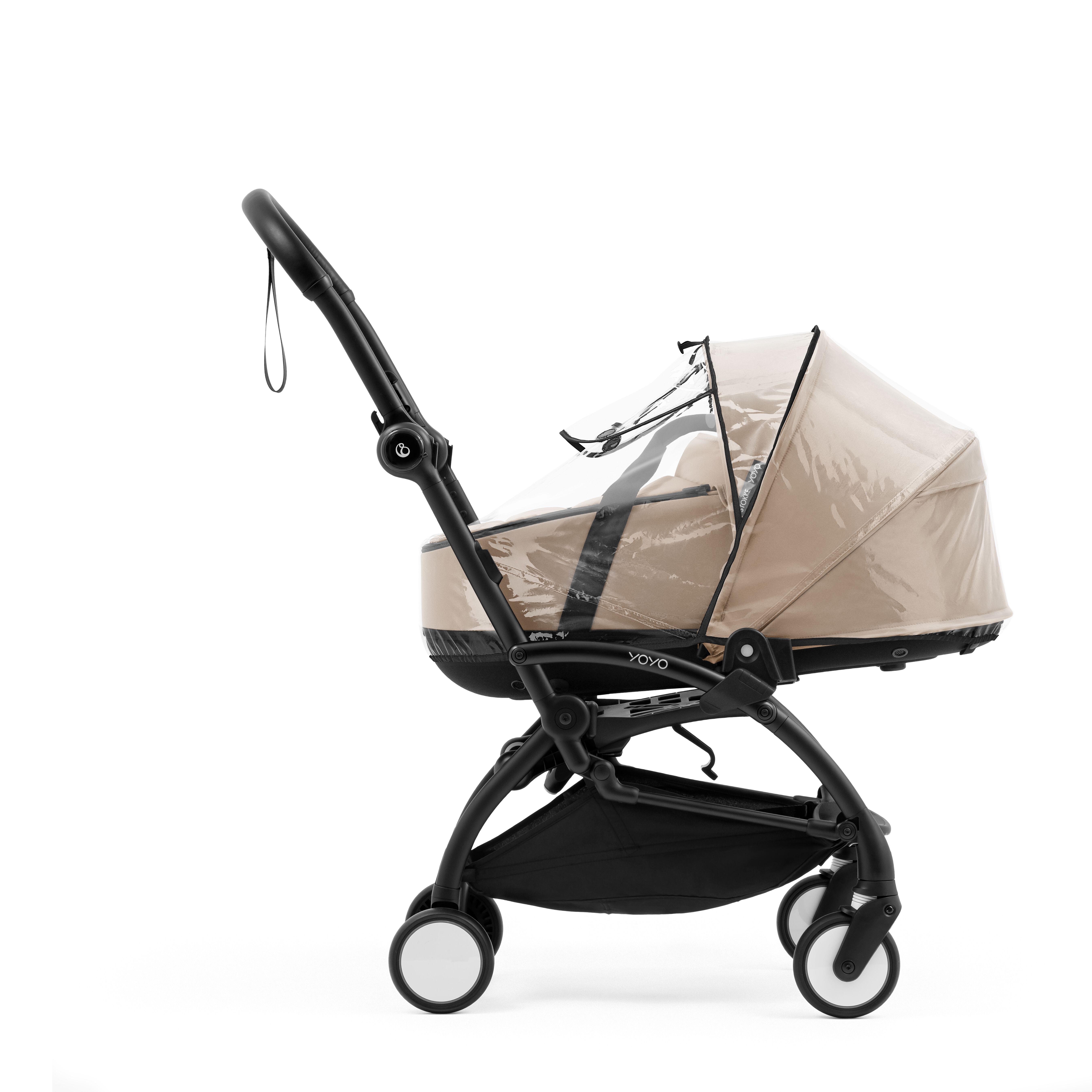 Stokke® YOYO5 Bassinet, Taupe, with Rainover. Profile-view.