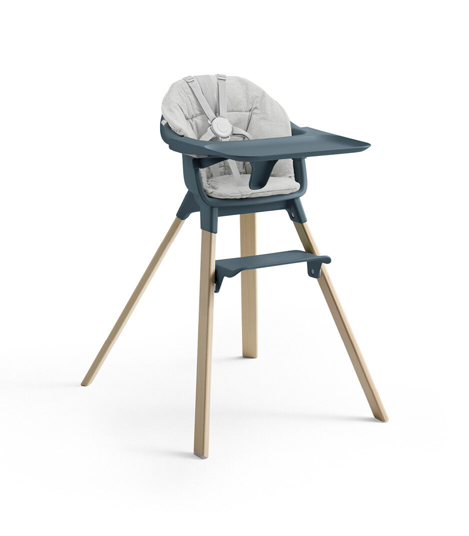 Stokke® Clikk™ High Chair with Tray and Harness, in Natural and Fjord Blue. Cushion Nordic Grey.