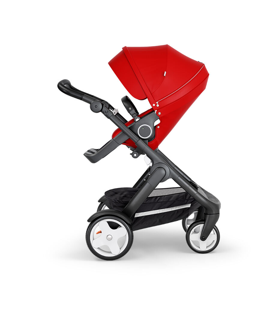 Stokke&reg; Trailz&trade; with Black Chassis, Black Leatherette and Classic Wheels. Stokke&reg; Stroller Seat, Red.