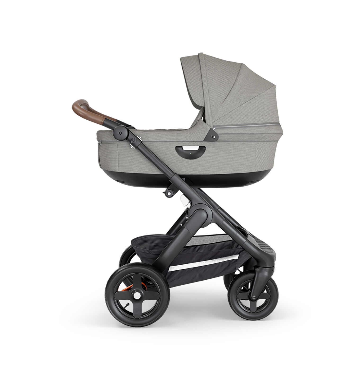 Stokke&reg; Trailz&trade; with Black Chassis, Brown Leatherette and Terrain Wheels. Stokke&reg; Stroller Carry Cot, Brush Grey.