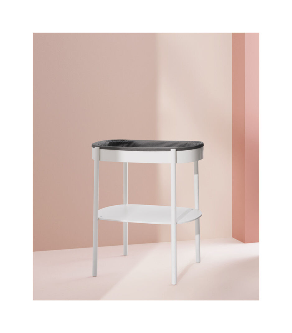 Oval changing table for babies Stokke