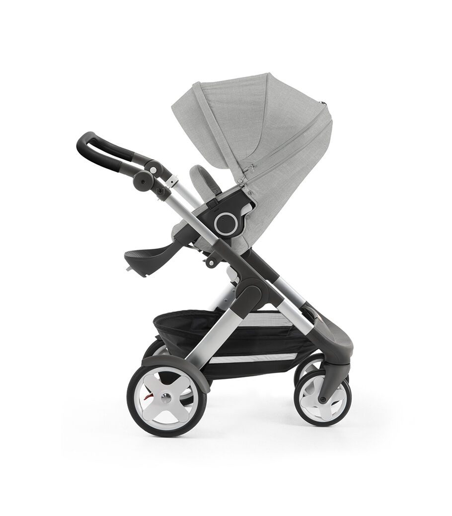 Stokke&reg; Trailz&trade; with silver chassis and Stokke&reg; Stroller Seat, Grey Melange. Classic Wheels.