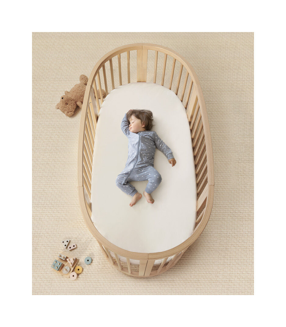 Stokke® Sleepi™ Bed V3 Natural. Closed, with mattress.