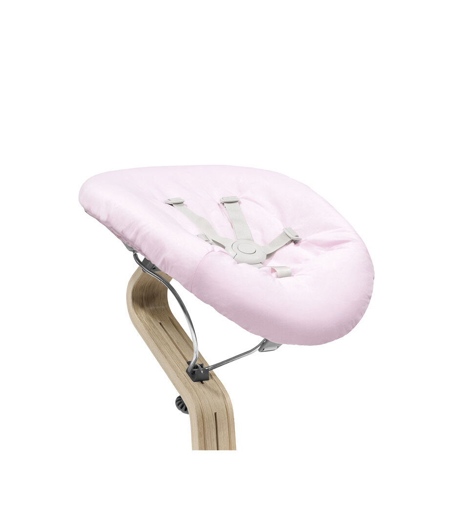 Stokke® Nomi® Chair Natural with Newborn Set Pink. Close-up.