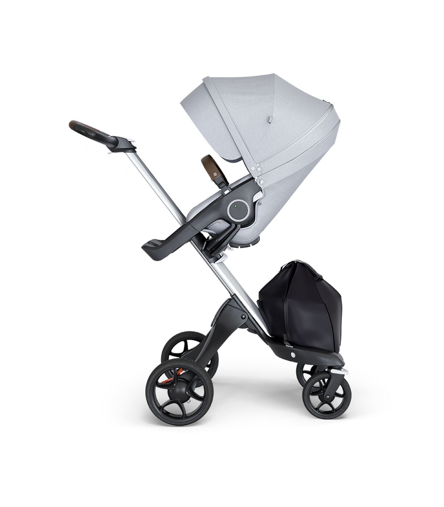 Stokke® Xplory® wtih Silver Chassis and Leatherette Brown handle. Stokke® Stroller Seat Grey Melange. view 1