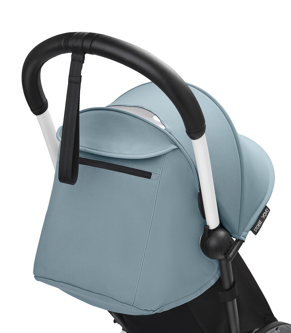 Stokke® YOYO3® 6+ Aqua. White Frame. Handle bar, close-up. Angled.