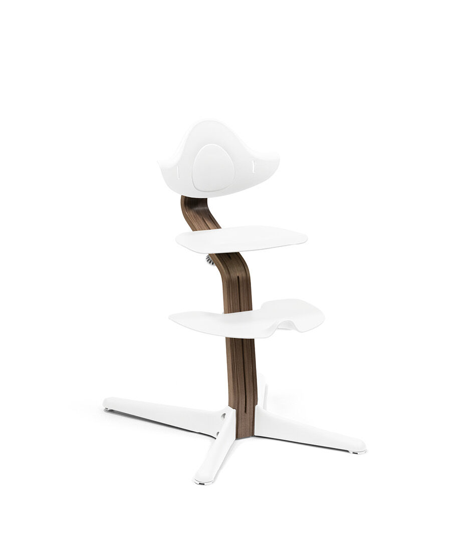 Stokke® Nomi® Chair. Premium Walnut wood and White plastic parts. 