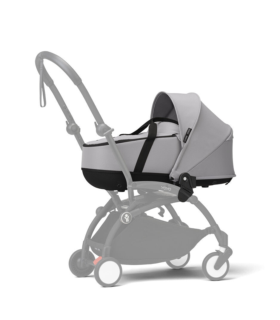 Stokke® YOYO3® Newborn Shell. Stone. Black Frame. Shadowed frame.