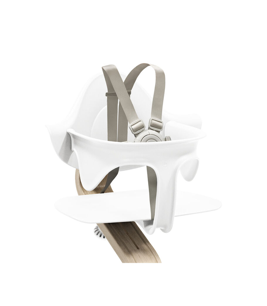 Stokke® Nomi® Chair Natural-White with Baby Set. US variant w/Harness. Close-up. view 22