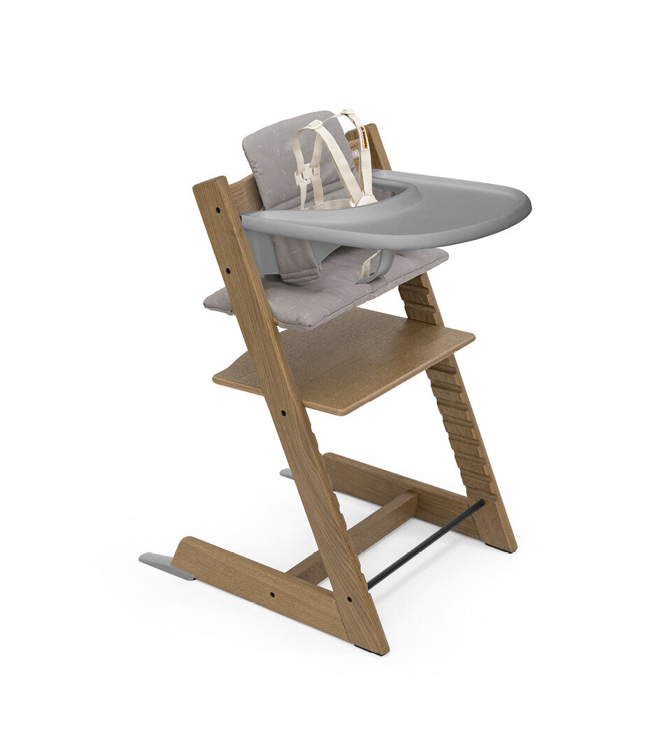 Tripp Trapp® Bundle. Chair Oak Brown (2021), Strom Grey Baby Set2 with Tray and Classic Cushion Icon Grey. US bundle.