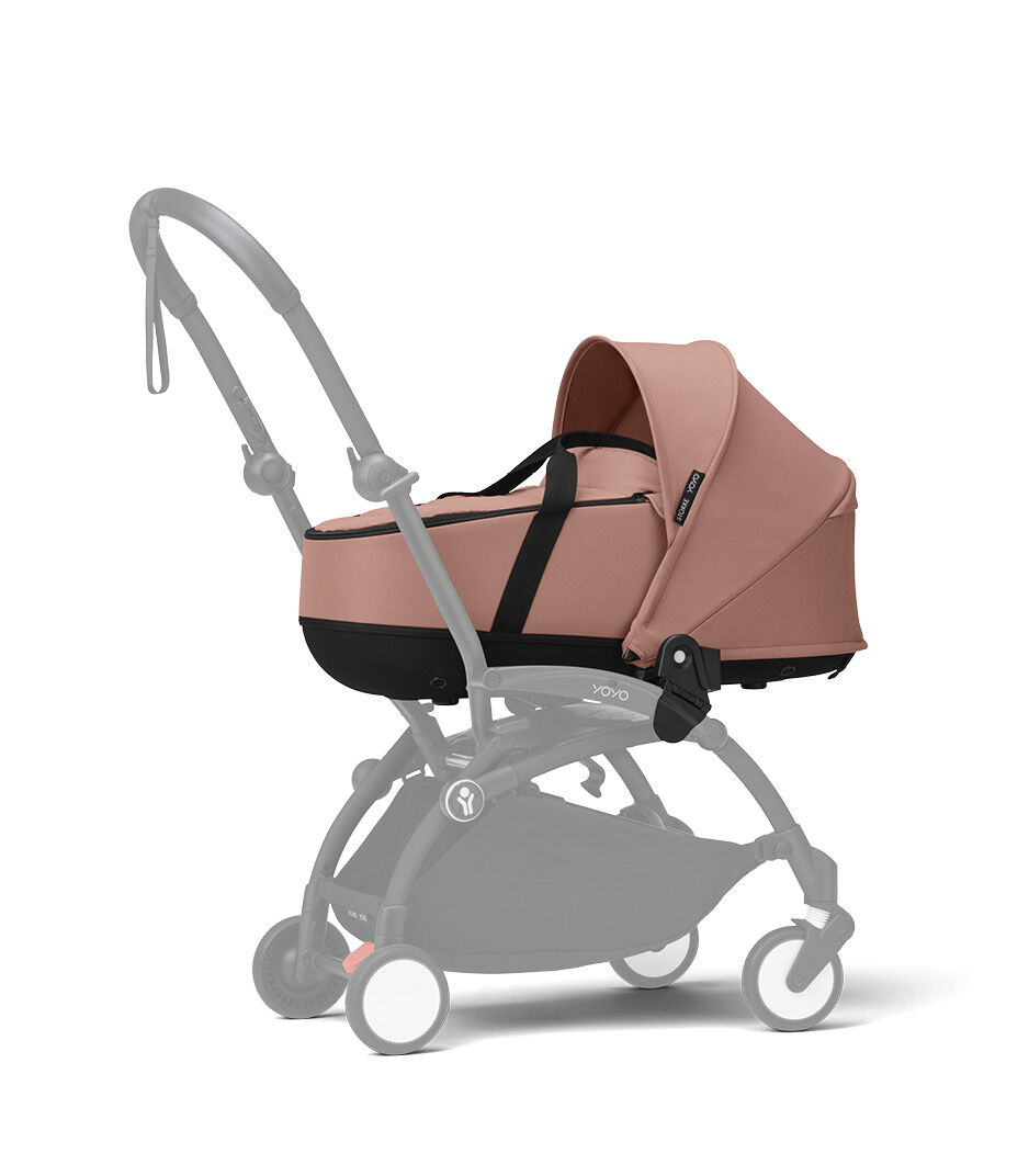 Stokke® YOYO3® Newborn Shell. Ginger. White Frame. Ginger. Shadowed frame.