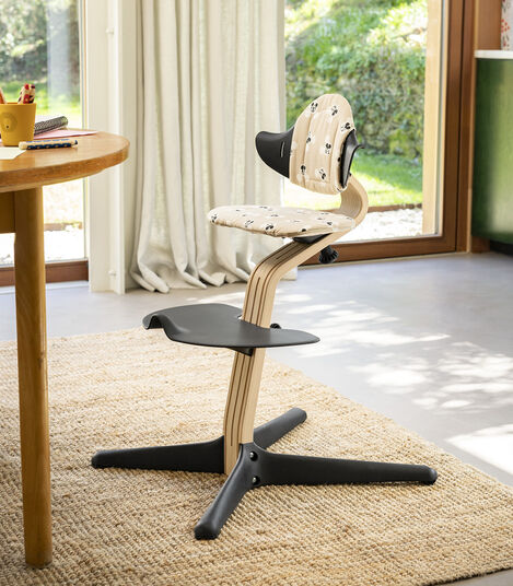 Stokke® Nomi® Chair Natural/Black with Disney Mickey Signature cushion. view 5