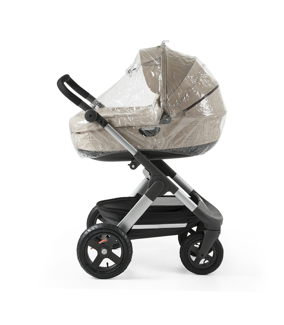Chassis with Stokke® Stroller Carry Cot, Beige Melange. Rain Cover.