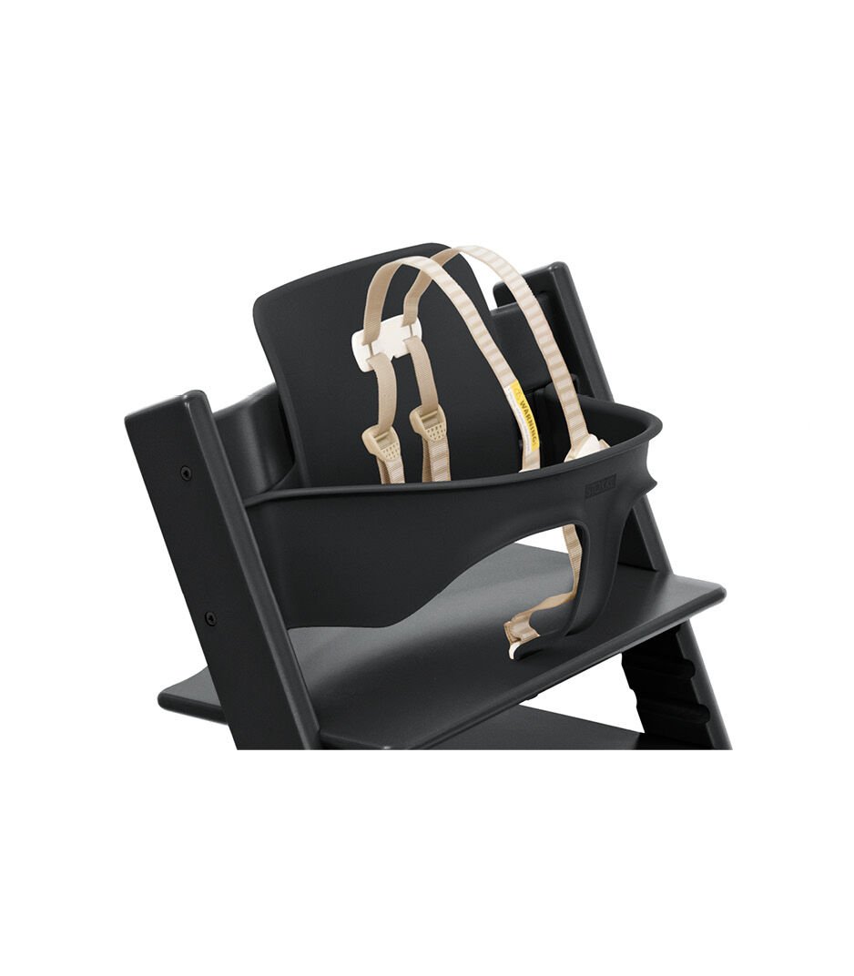 Tripp Trapp® Chair Black with Baby Set. Close-up. US with Harness.
